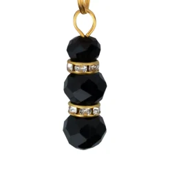Pinces à mamelons dorées avec des perles noires