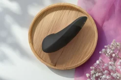 Womanizer Enhance - Duo clitoridien air et vibration - Noir